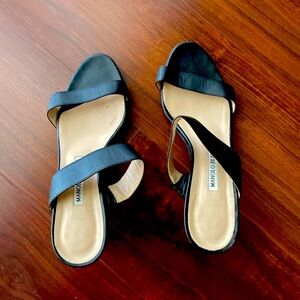 Manolo Blahnik . Black size:38. Good condition no peeling heels are good.